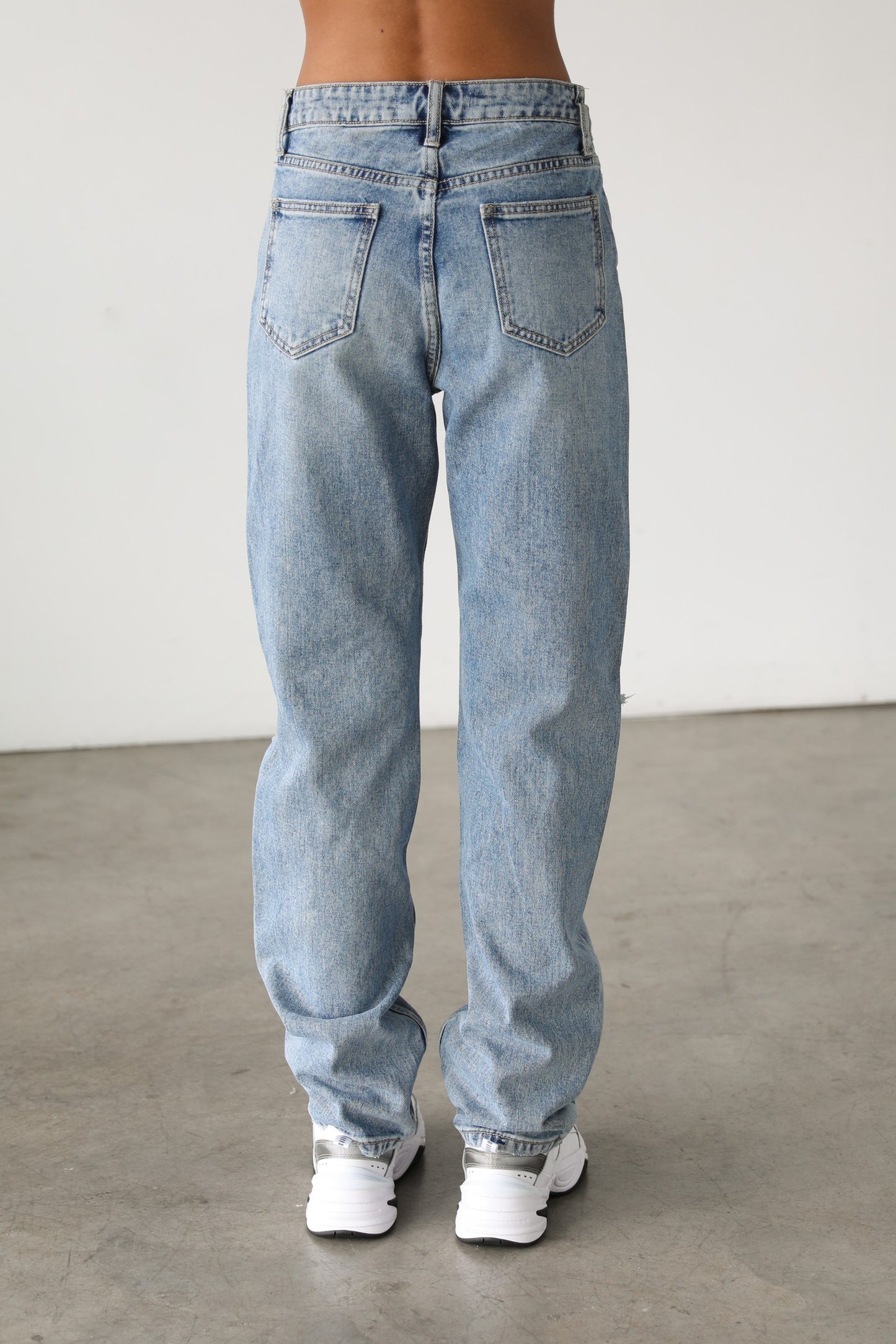 High Rise Straight Leg Distressed Denim | Medium Wash