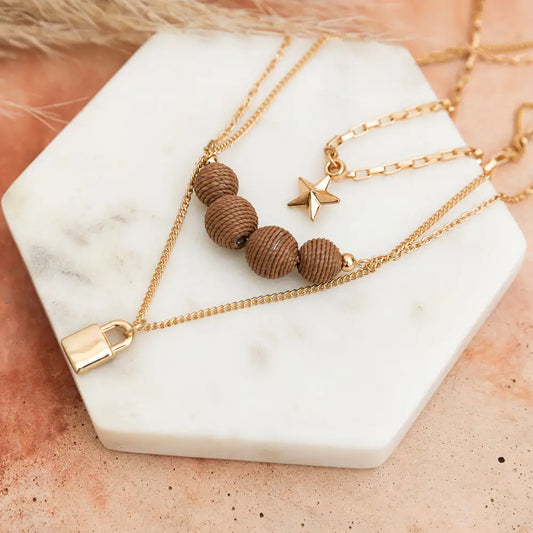 Three Layered Rustic Gold Charmed Necklace
